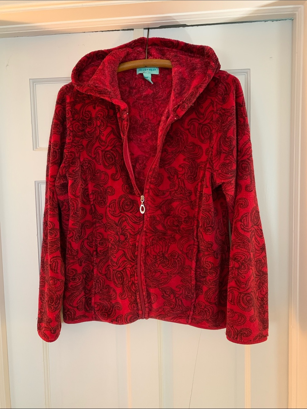 Silverwear hoodie ladies/juniors size large 
Red with blue scrolly design
